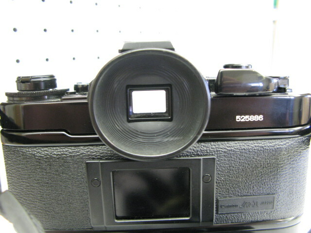 Canon A-1 film camera body with Genuine strap and Power Winder A2 Canon A-1 film camera body with Genuine strap and Power Winder A2