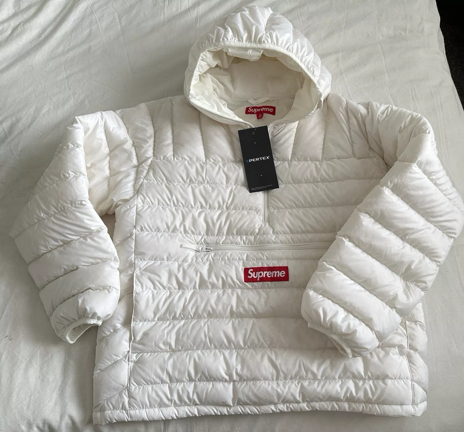 Petit pull à capuche micro duvet demi zip Supreme