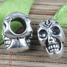Cuentas espaciadoras calavera color plata tibetana 18 piezas EF0238
