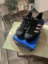 Adias Women Black And Gold Flats