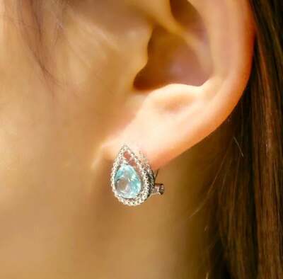 The Don t Cry For Me Tear Drop estate inspired zirconium/topaz earrings