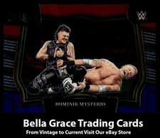 2023 Panini Select WWE Dominik Mysterio #239 RAW Ringside Red & Blue Prizms