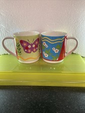 A Pair of Maxwell Williams Coffee Mugs Red and White Floral and Butterfly