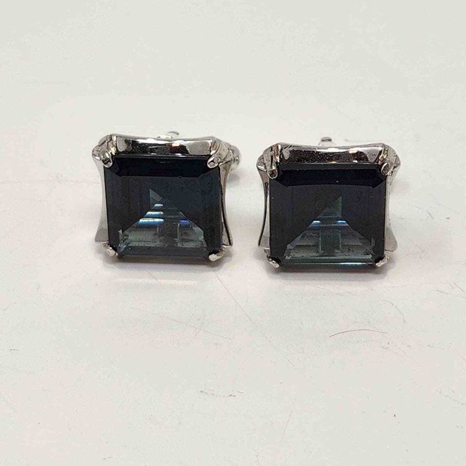 Sterling silver cufflinks with deep green square crystals — a striking vintage piece that punches way above its $15 price tag for old-school formal style.