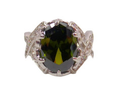 Large green oval cubic zirconia stone ring with clear CZ stones on sides Size 7