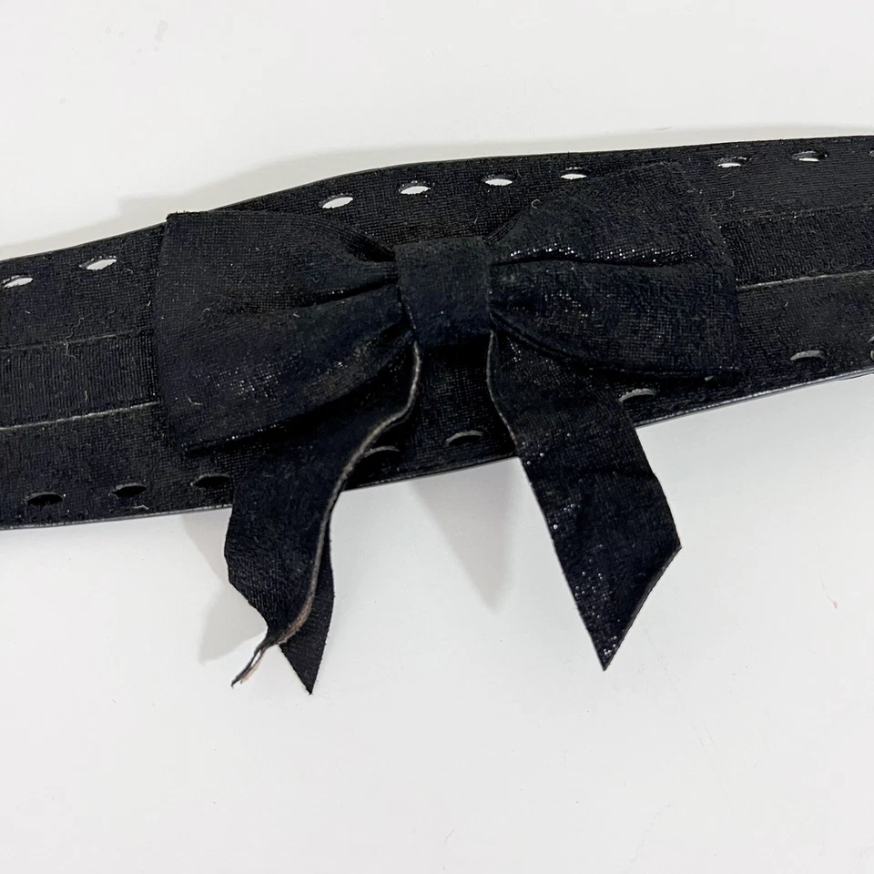 Cinturón elástico Bebe negro con lazo grande ancho brillante talla M/L Foto 2 de 4