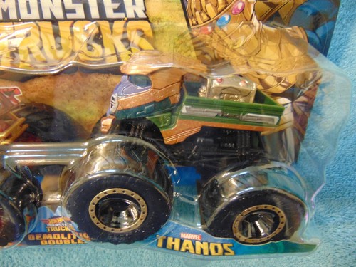 IRON MAN & THANOS DEMOLITION DOUBLES 2 pack 2021 Hot Wheels Monster Trucks - Picture 3 of 4