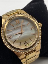 Liz Claiborne Ladies Gemmed Quartz Watch 38mm Round Gold Tone Bracelet Band MOP
