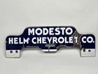 Modesto CA Porcelain License Plate Topper Helm Chevrolet Vintage  AUCTION