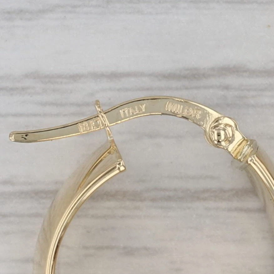 Pendientes de aro de oro amarillo de 18 k con tapa a presión ovalada Foto 4 de 4