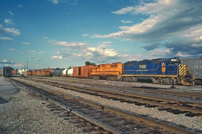 MC 254 and DH 7401 in the Maine Central yard, Bangor, ME 1985 8.5 x 11 Photo