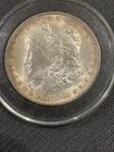 18990 Silver Dollar Circulated US Coin New Orleans Mint. Capsule included. Toner