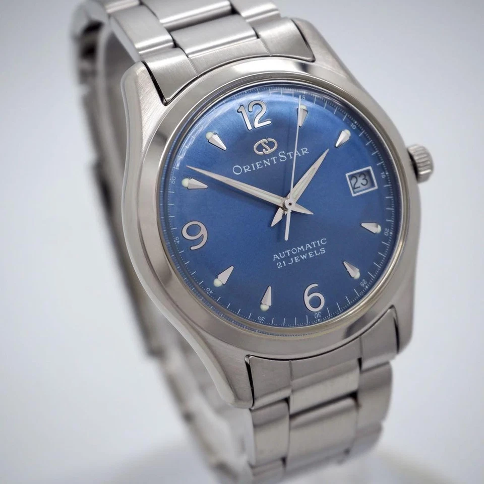 Reloj automático Orient Star para hombre Explorer esfera azul correa plateada 34,5 mm Foto 2 de 4