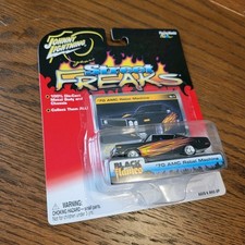 Johnny Lightning Street Freaks 1970 70 Amc Rebel Machine Black With Flames 164 Johnny Lightning Street Freaks 1970 70 Amc Rebel Machine Black With Flames 164