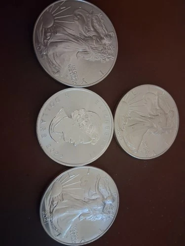 Lot of 4 oz silver 3 Silver American Eagles 1 oz. One leaf Fine .999 oz Coins