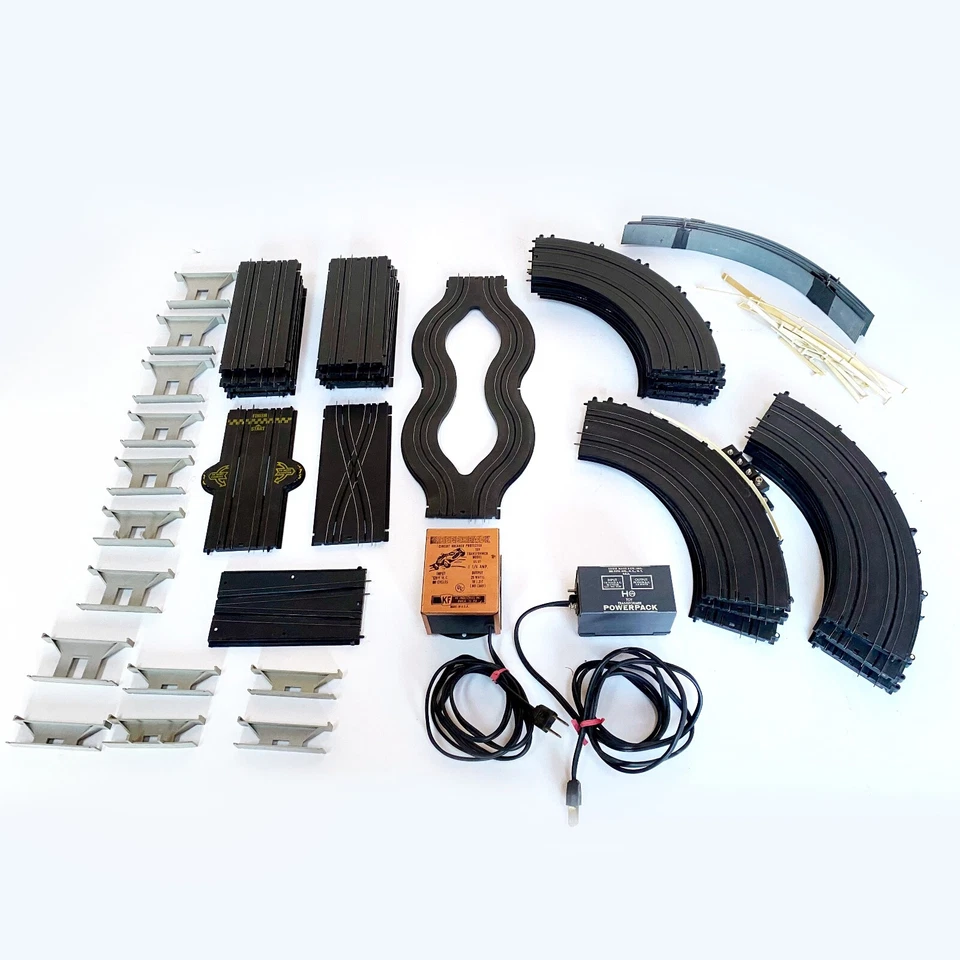 28 Pieces Marx H.O. Slot car Track + 13 Stantons, 2 Power Packs & More - Image 2 of 4