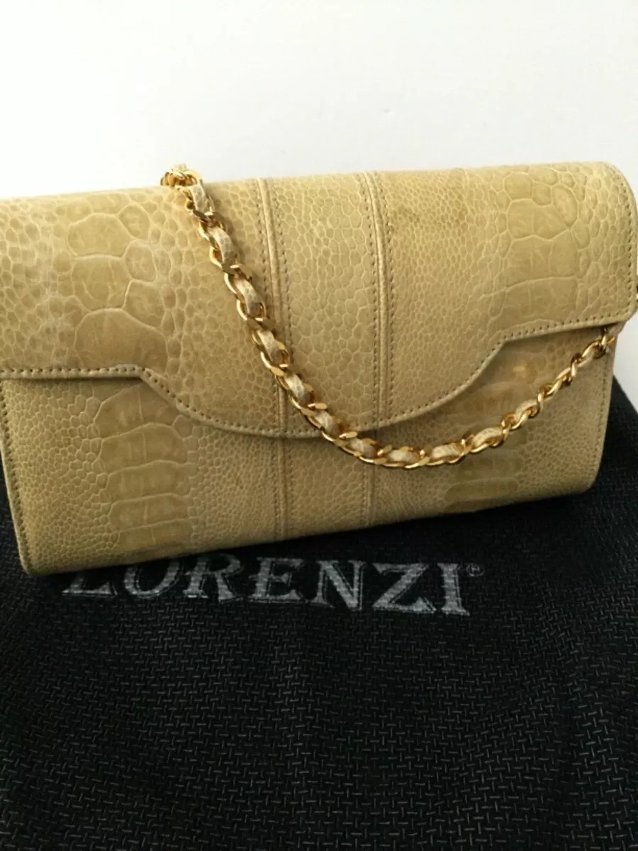 Beige clutch bag designer clearance