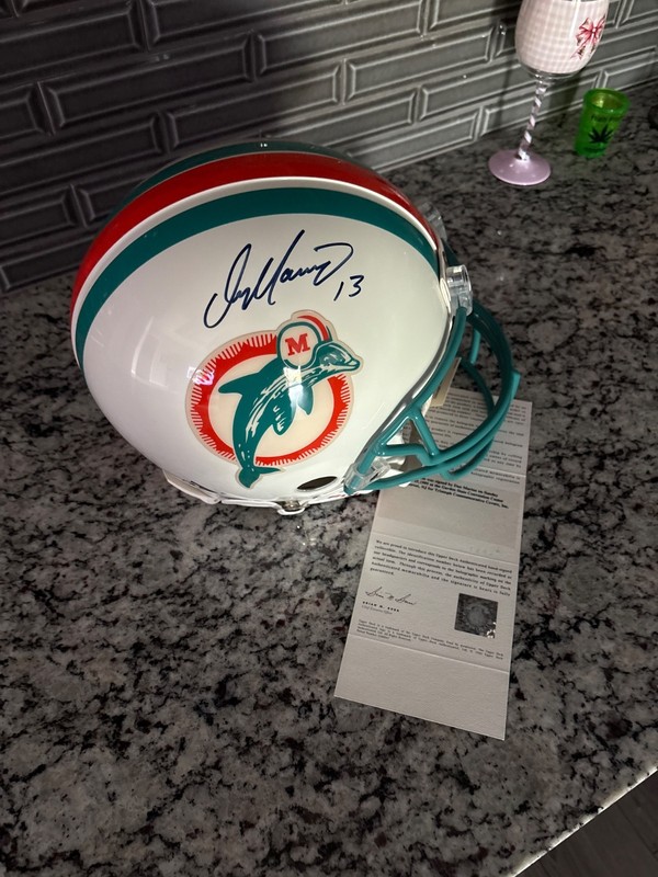 Full size helmet authentic, autographed by DanMarino with Coa from upper deck