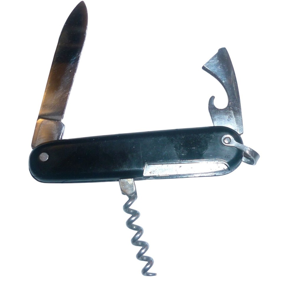 Spanish-made Iher Inox multi-tool with a jet-black handle, corkscrew, and bottle opener — a sleek, conversation-starting oddity.