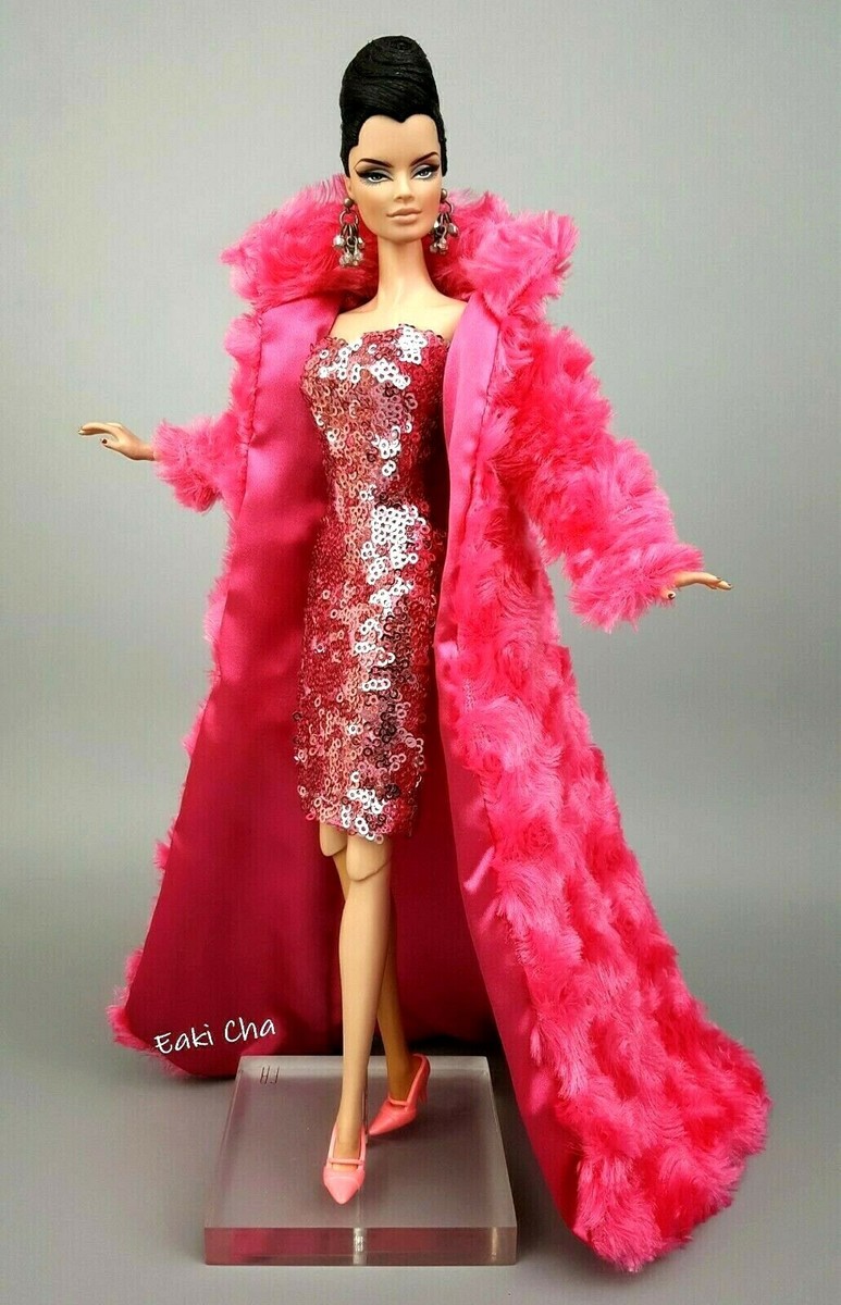 formal dress with fur coat Feels like the perfect day for a faux fur topper over your dress or gown.  It really completes the look and we have so many to choose from! Stay cozy,  friends! Also still so many gorgeous holiday party