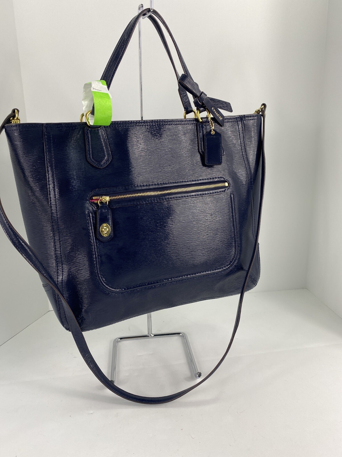 navy blue patent leather handbag