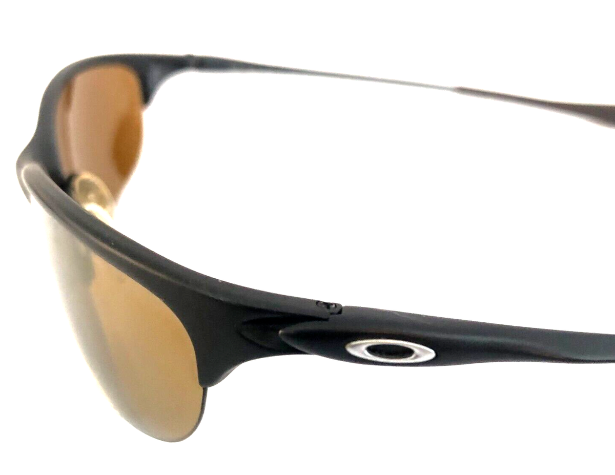 ✨Rare✨vintage OAKLEY HALF WIRE suglasses RARE OAKLEY HALF WIRE SUNGLASSES Dark Carbon Frames w/ Gold