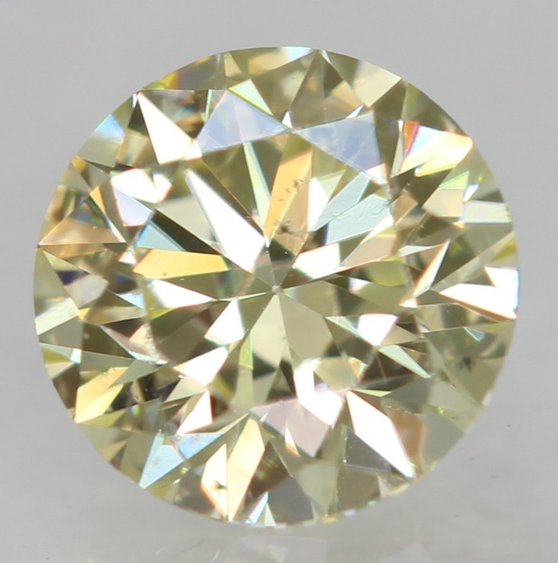 0.27 Carat Fancy Yellow VS1 Round Brilliant Natural Enhanced Diamond 4.12m VIDEO