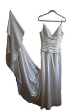 Bridal Gown Size 10. Beautiful Train  Bling Straps. Preowned
