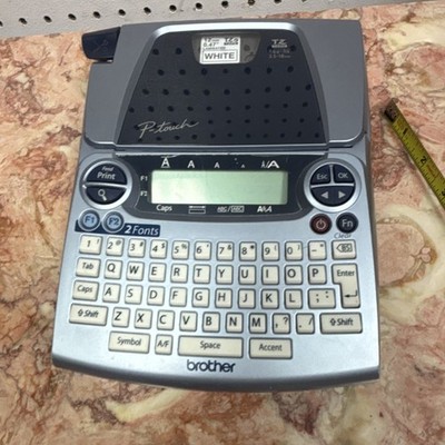 Brother P-touch Label Maker w/ TZe 12mm (0.47 in) Laminated White Tape