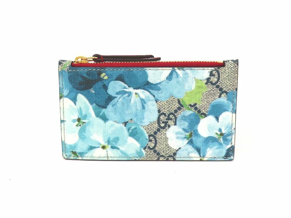 Authentique porte monnaie Gucci couleur bleu rouge GG cuir suprême GG fleurs L13 cm H7 cm