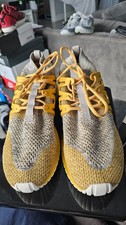 Zapatos para hombre Adidas Tubular Nova Primeknit St Nomad amarillos