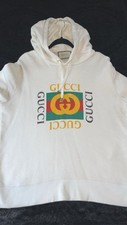 Authentic Gucci Sweater.. in Excellent Condition Small Physical hole..