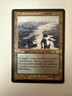 1 x Delta Contaminado (polluted delta) onslaught MP Spanish dual land fetch