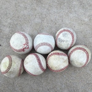 7 USED baseballs