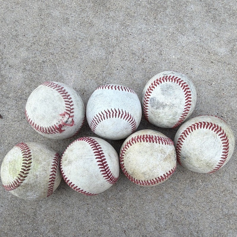 7 USED baseballs