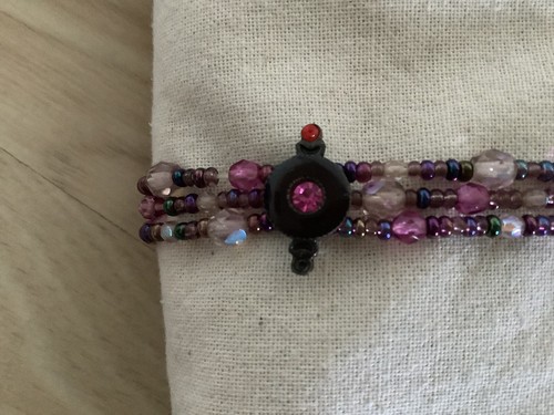 Amethyst colour 3 strand bracelet by Marks and Spencer. - Picture 2 of 4
