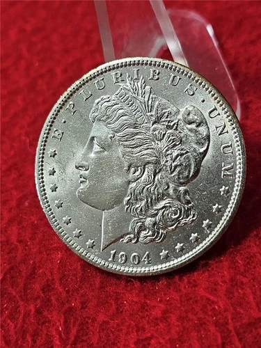 1904-O  AU MORGAN SILVER DOLLAR       YOU VS ME              #MF-T1474
