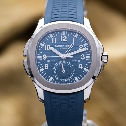 Patek Philippe Aquanaut Travel Time White Gold Blue Dial 5164G...