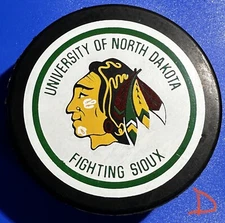 University of North Dakota Fighting Sioux Old Souvenir Logo Puck