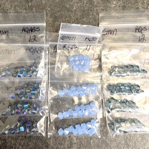 144pc 6mm bicone crystal beads - aqua blues mix - Swarovski?