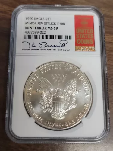 1990 American Silver Eagle NGC MS69 Mint Error Rev. Struck Thru Kenneth Bressett
