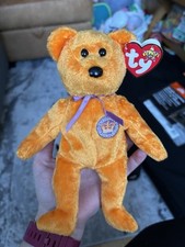 Celebrations 50th anniversary Bear Ty Beanie Baby, a collectible plush toy.