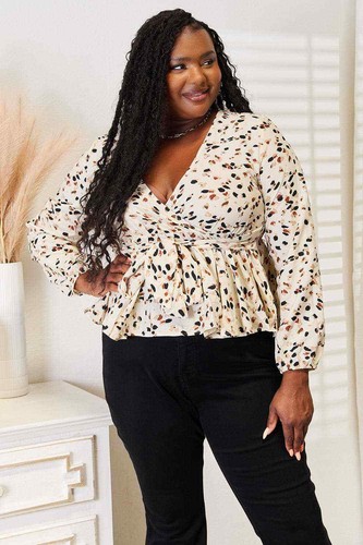 Top vibrante plunge peplum - detalle atado - Imagen 2 de 11