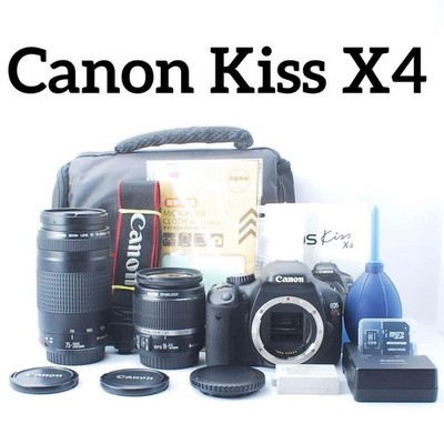 Canon Kiss X4 77 shots W lens image stabilization super telephoto bag included