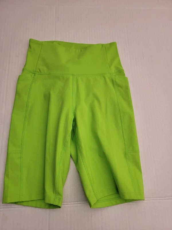 girlfriend-collective compression high rise side pockets shorts