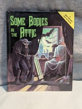 Some Bodies in the Attic (A Spooky Pop-Up Book) - Hardcover 