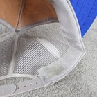 White 1980s US Air Force Indian Chief trucker hat with mesh front and worn tan fabric lining.