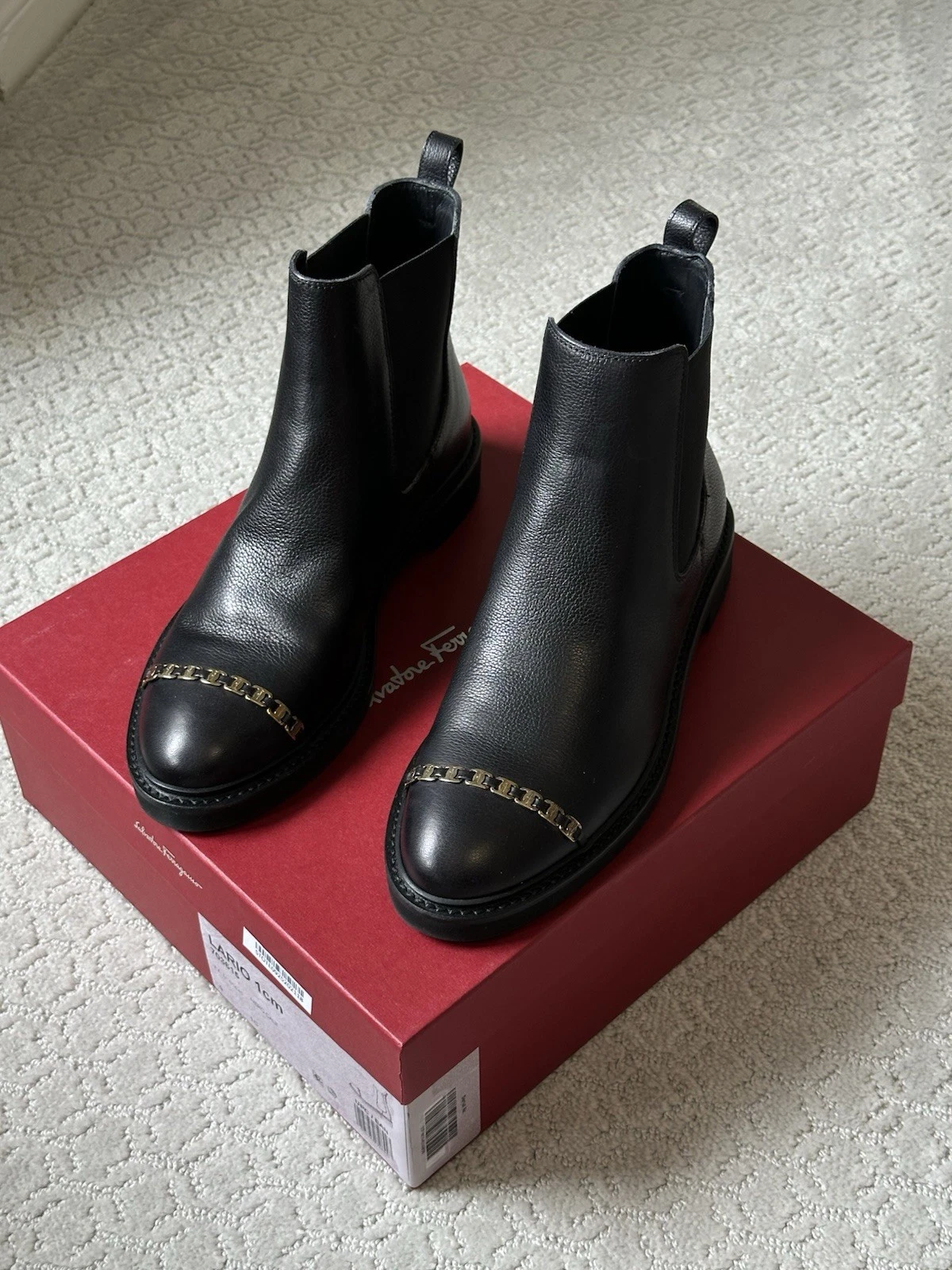Ferragamo — Salvatore Ferragamo BlackLeather Chelsea Ankle Boots with Gold Chain Detail
