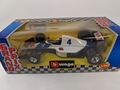 Burago McLaren MP4/5 F1 Grand Prix #4 CORN NUTS 1/24 Modellauto mit Box