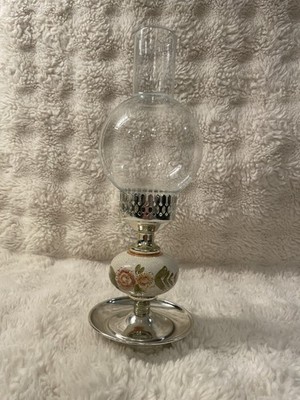Victorian Style Brassvintage-style candle..featuring a floral ceramic